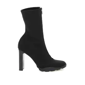 Alexander Mcqueen boots with slim sole.