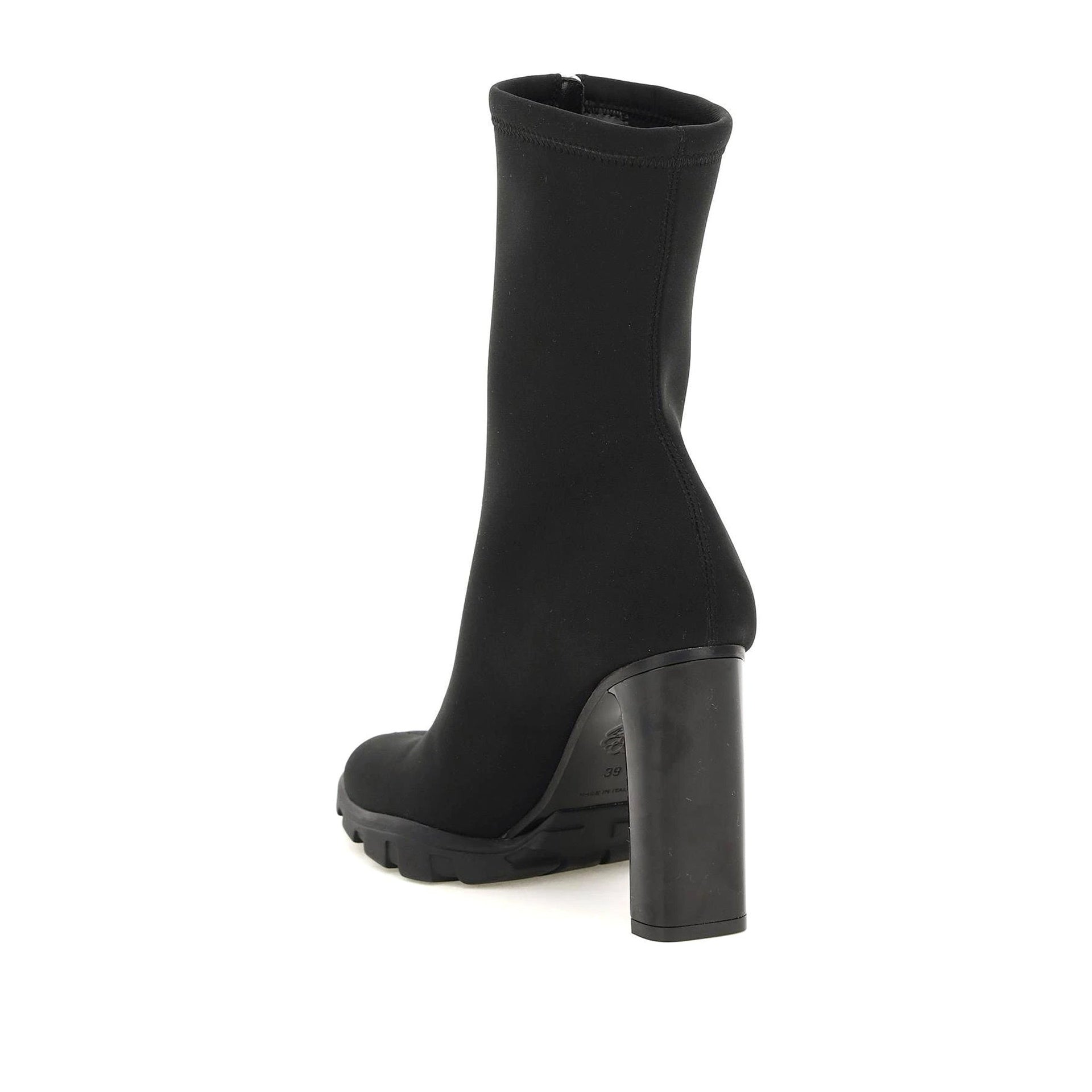 Alexander Mcqueen boots with slim sole.