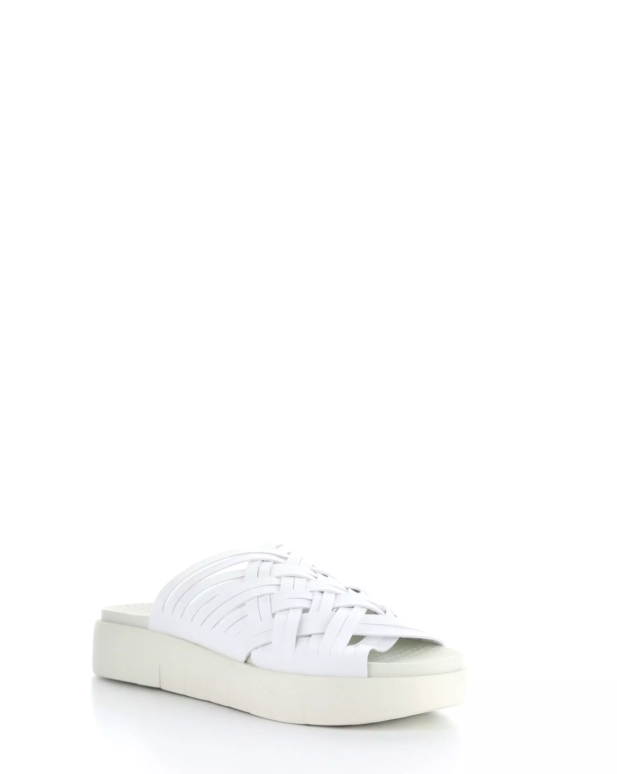 White slip-on sandals.