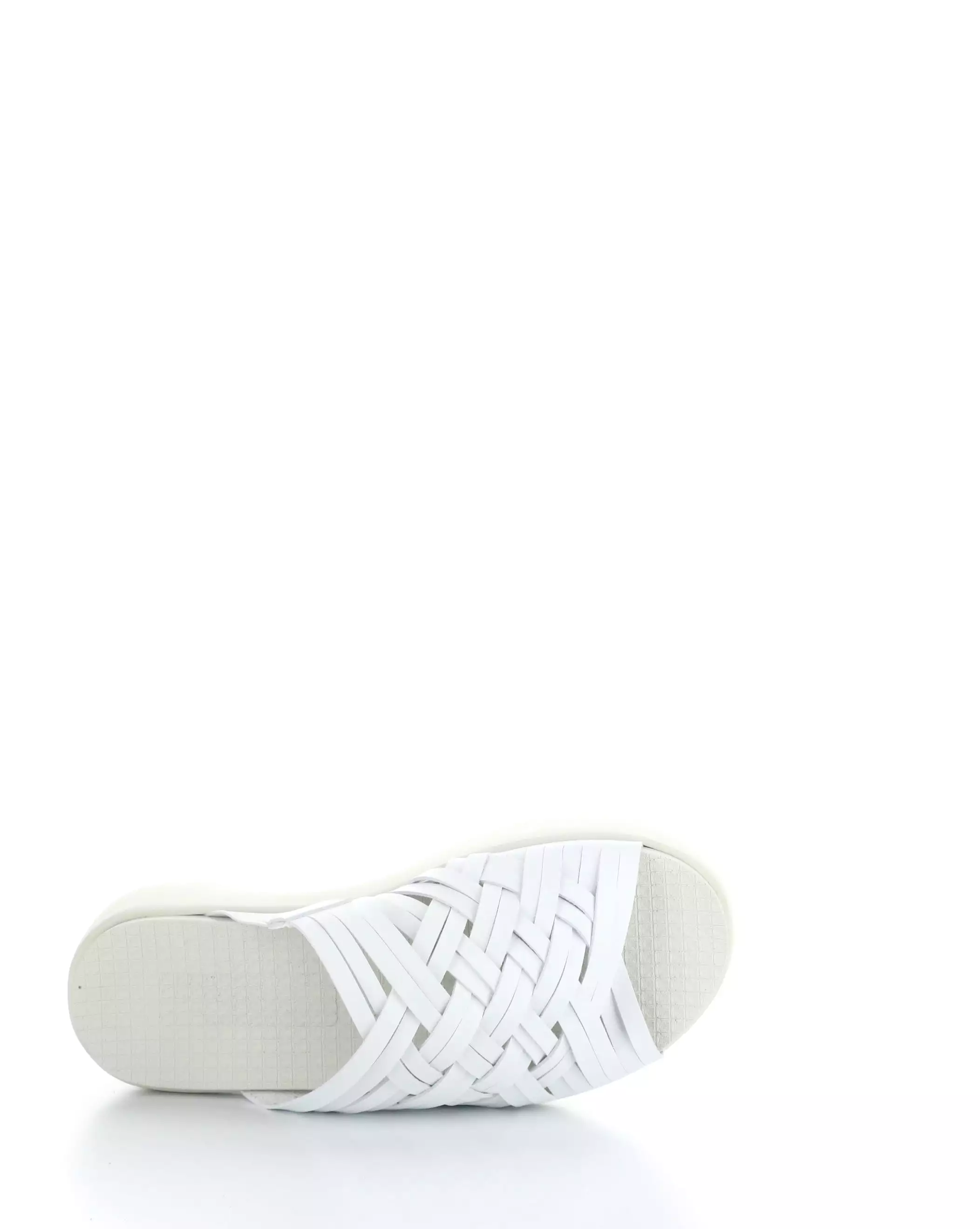 White slip-on sandals.