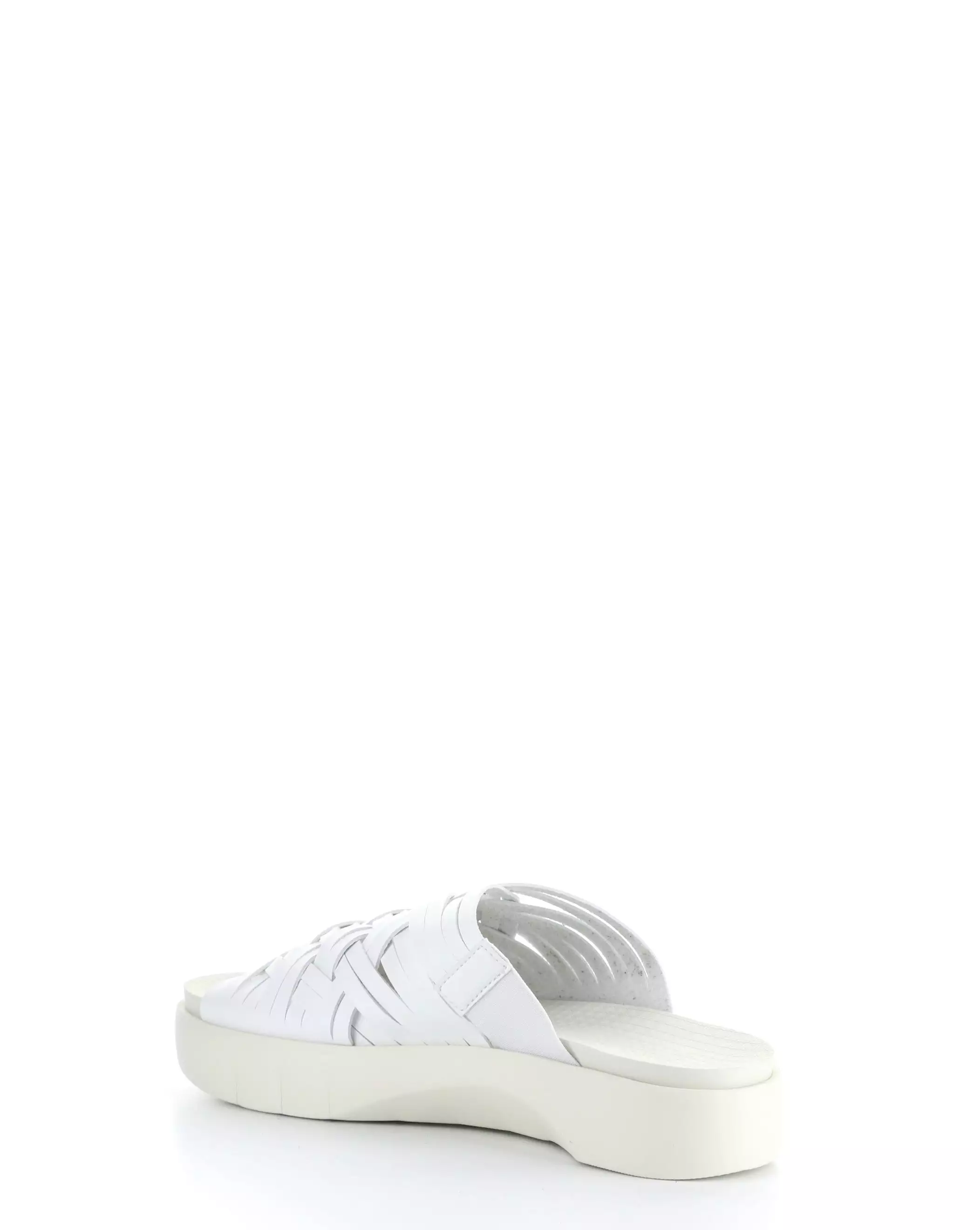 White slip-on sandals.